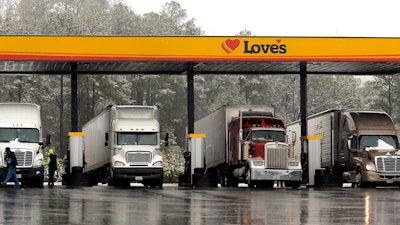 Trucks at a gas station in Emerson, Ga., Feb. 11, 2014.