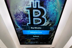 Bitcoin logo on the display screen of a cryptocurrency ATM at the Smoker's Choice store in Salem, N.H., Feb. 9, 2021.