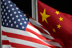 American and Chinese flags at Genting Snow Park, Zhangjiakou, China, Feb. 2, 2022.