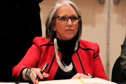 New Mexico Gov. Michelle Lujan Grisham prepares to sign an executive order, Albuquerque, March 10, 2022.