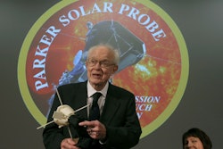 Eugene Parker holds a replica of the Parker Solar Probe at the William Eckhardt Research Center at the University of Chicago, May 31, 2017.