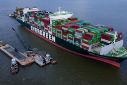 Crews dredge near the container ship Ever Forward near Pasadena, Md., March 21, 2022.
