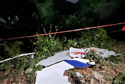 In this photo released by China's Xinhua News Agency, debris is seen at the site of a plane crash in Tengxian County in southern China's Guangxi Zhuang Autonomous Region, Tuesday, March 22, 2022. A China Eastern Boeing 737-800 with more than 100 people on board crashed in a remote mountainous area of southern China on Monday, officials said, setting off a forest fire visible from space in the country's worst air disaster in nearly a decade.