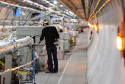 A technician works in the Large Hadron Collider tunnel of the European Organization for Nuclear Research (CERN), Meyrin, Switzerland, Feb. 16, 2016.