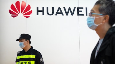 Huawei booth at the PT Expo in Beijing, Sept. 28, 2021.