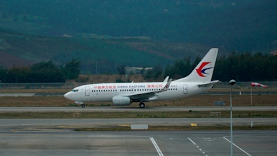 A China Eastern Airlines plane taxis on a runway at Kunming Changshui International Airport, Kunming, China, March 22, 2022.