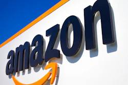 This April 16, 2020 shows the Amazon logo in Douai, northern France. A federal labor board is seeking the reinstatement of an Amazon employee who was fired after leading a protest in the early days of the pandemic calling for the company to do more to protect workers against COVID-19.