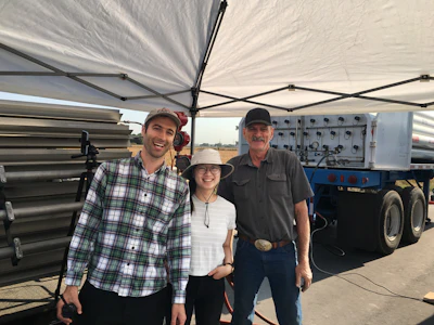 From left, researchers Evan Sherwin and Yuanlei Chen with equipment operator Jeff Gamble in the Permian Basin.
