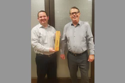 Matt Nemec, director, supplier business development at Digi-Key, presented with the Global Performance of the Year award from Doug Steele, head of distribution sales Americas for Harwin.
