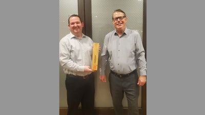 Matt Nemec, director, supplier business development at Digi-Key, presented with the Global Performance of the Year award from Doug Steele, head of distribution sales Americas for Harwin.