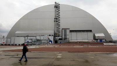 Shelter covering the exploded reactor at the Chernobyl nuclear plant, Chernobyl, Ukraine, April 15, 2021.