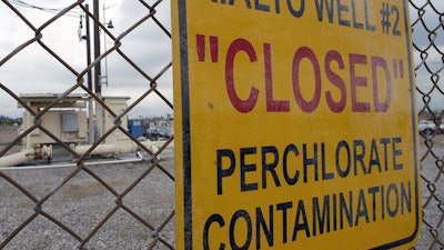 Sign posted outside a water well in Rialto, Calif., March 28, 2005.