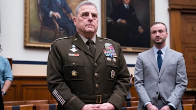Chairman of the Joint Chiefs of Staff Gen. Mark Milley arrives for a House Armed Services Committee hearing on the fiscal year 2023 defense budget, Tuesday, April 5, 2022, in Washington.