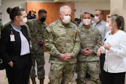 n this image provided by the U.S. Army, University of Utah Health staff speak with the U.S. Army North personnel in Salt Lake City, Utah, March 2, 2022, during a visit to the University of Utah Hospital.