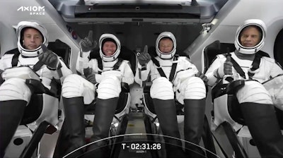 This photo provided by SpaceX shows the SpaceX crew seated in the Dragon spacecraft on Friday, April 8, 2022 in Cape Canaveral, Fla. SpaceX is scheduled to launch three rich businessmen and their astronaut escort to the International Space Station for more than a week’s stay.