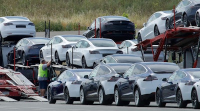 In this May 13, 2020, file photo, Tesla cars are loaded onto carriers at the Tesla electric car plant in Fremont, Calif. California wants electric vehicle sales to triple in the next four years to 35% of all new car purchases. Regulations passed Tuesday, April 12, 2022 by the California Air Resources Board set a roadmap for the state to achieve California Gov. Gavin Newsom's ambitious goal of phasing out the sale of new gas powered cars. The draft must go through a months-long state regulatory process and get approval from the U.S. EPA.