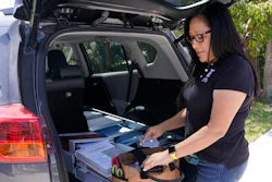Natalia Ponce De Leon, owner of Custom Window Furnishings, reorganizes her tools in the back of her nine-year-old Toyota RAV4 after visiting with a client, Wednesday, April 13, 2022, in Delray Beach, Fla. Ponce De Leon traded her 2018 Toyota Tacoma for a more efficient car where she estimates will save her hundreds of dollars a month. She is also able to carry all the tools she needs for her business.