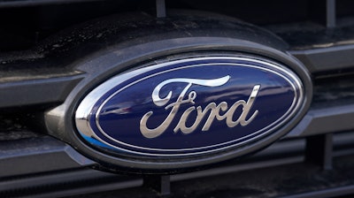 In this Sunday, April 25, 2021, photograph, the blue oval logo of Ford Motor Company is shown at a dealership in east Denver. Ford is recalling more than 650,000 pickup trucks and big SUVs in the U.S., Thursday, April 21, 2022, because the windshield wipers can break and fail. The recall covers certain F-150 pickups, and Ford Expedition and Lincoln Navigator SUVs from the 2020 and 2021 model years.