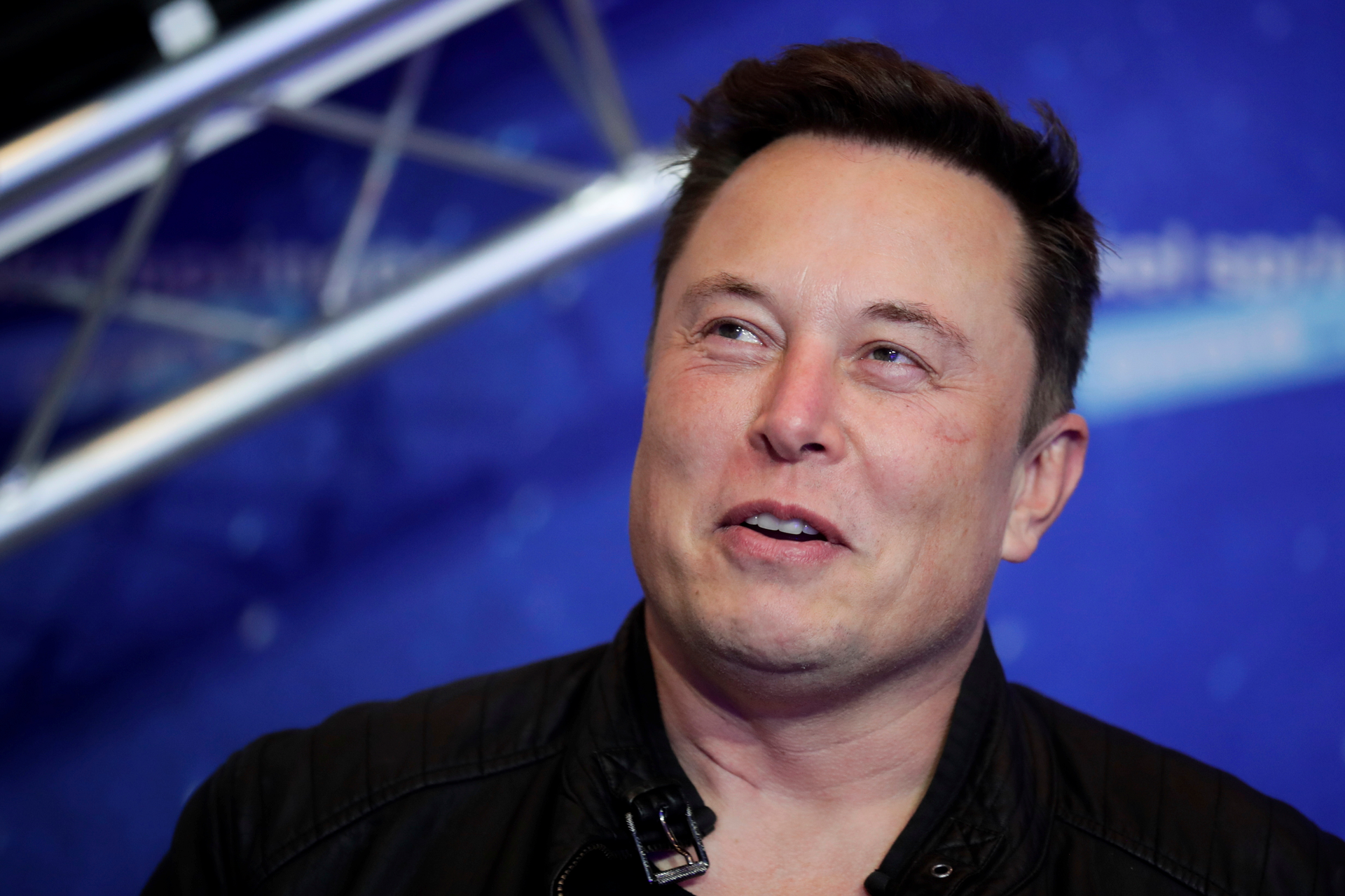 Tesla and SpaceX CEO Elon Musk arrives on the red carpet for the Axel Springer media award in Berlin on Dec. 1, 2020. Musk says he has lined up $46.5 billion in financing to buy Twitter, and he&rsquo;s trying to negotiate an agreement with the company. The Tesla CEO says in documents filed Thursday, April 21, 2022 with U.S. securities regulators that he&rsquo;s exploring a tender offer to buy all of the social media platform&rsquo;s common stock for $54.20 per share in cash.