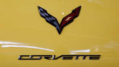 This is a the logo on the rear of a 2016 Corvette on display at the Pittsburgh International Auto Show in Pittsburgh, Feb. 11, 2016. General Motors says it will be offering an electrified Corvette as early as next year as it continues to strengthen its foothold in the electric vehicle market. President Mark Reuss said in a statement on LinkedIn on Monday, April 25, 2022 that the automaker will also offer a fully electric, Ultium-based Corvette in the future.