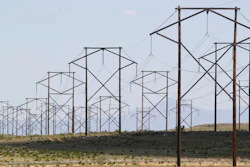This May 20, 2012 file photo shows one of the major transmission lines that runs to the west of Albuquerque, N.MThe federal government has finished another environmental review of a proposed transmission line that will carry wind-generated electricity from rural New Mexico to big cities in the West and similar reviews are planned for two more projects that would span parts of Utah and Nevada, the U.S. Interior Department announced Thursday, April 28, 2022.