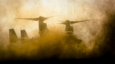 A U.S. Marine MV-22B Osprey lands at Babadag Training Area, Romania, in this 2015 photo illustration, kicking up clouds of potentially dangerous particulates in the process. Research at NPS employing the latest in Ultra High Temperature Ceramics has the potential to increase the resilience of turbine engines to particulate ingestion, critical for DOD aircraft operating in sandy and salty environments.