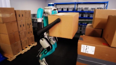 Digit, Agility Robotics' robot, moving packages full of sorted goods inside a warehouse.