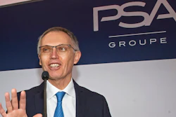 In this Feb. 26, 2020 file photo, CEO of PSA Groupe Carlos Tavares arrives for the presentation of the company's 2019 full year results in Rueil-Malmaison, west of Paris. Reports of Stellantis CEO Carlos Tavares’ remuneration package of 19.15 million euros during Stellantis’ first year of existence, not counting long-term incentives, caused waves on as Macron and Le Pen campaigned ahead of the April 24 runoff vote. Polls show purchasing power and inflation are a top voter concern. Centrist President Emmanuel Macron, perceived by many voters as being too pro-business, called the pay package “astronomical” and pushed for a Europe-wide effort to set ceilings on “abusive” executive pay.
