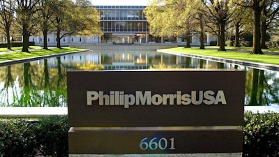 In this November 2003 file photo is the reflecting pool in front of the Philip Morris USA headquarters in Richmond, Va.