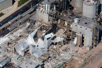Part of the Didion Milling Plant in Cambria, Wis., lies in ruins following an explosion in this June 1, 2017 photo,. A federal grand jury has charged a milling company with fraud and conspiracy in connection with the explosion that killed five workers in 2017. Court records indicate the grand jury indictment was announced Thursday, May 12, 2022, against Didion Milling Inc. and company leaders.