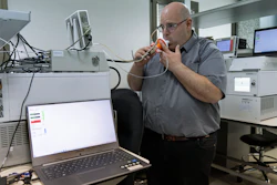 Israeli Harel Hershtik, vice president of strategy and technology at Scentech Medical, demonstrates his company's product, which he says can detect certain diseases by analysing a patient's breath, at the company's office in Rehovet, Israel, May 3, 2022. When he was 20 years old, Hershtik planned and executed a murder, shooting his victim in the head and burying the body in a crime that a quarter of a century later is still widely remembered for its grisly details. Today, he is the brains behind an Israeli health-tech startup with the backing of prominent public figures and deep-pocketed investors.