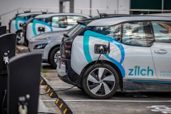 Electric vehicle charging station and car share parking are seen in Auckland, New Zealand, on Aug. 12, 2021. New Zealand will help pay for lower-income families to scrap their old gas guzzlers and replace them with cleaner hybrid or electric cars as part of a sweeping plan to reduce greenhouse gas emissions the government announced Monday May 16, 2022.