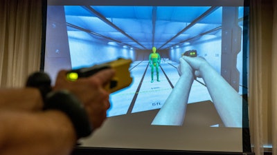 VR equipment and a version of the TASER 7 that utilizes VR technology for training, is demonstrated, Thursday, May 12, 2022, in Washington.