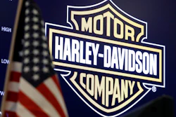 The logo for Harley-Davidson appears above a trading post on the floor of the New York Stock Exchange, March 3, 2020. Harley-Davidson shares fell more than 7% Thursday, May 19, 2022 after the motorcycle maker said it was suspending vehicle assembly and most shipments for two weeks due to a regulatory compliance issue with one of its suppliers.