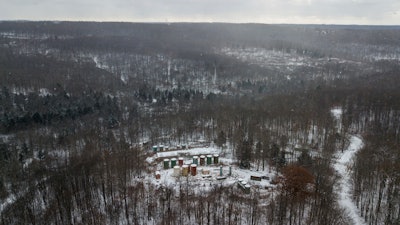 This Nov. 13, 2019, aerial photo shows part of an abandoned oil drilling project in the Allegheny National Forest in Pennsylvania. The U.S. Department of the Interior says 20 wells in that forest are among 277 “high priority” polluting orphan wells that will be cleaned up with $33 million from the bipartisan infrastructure act. The wells are on federal land in Pennsylvania, California, Kentucky, Louisiana, Ohio, Oklahoma, Texas, Utah and West Virginia.