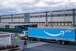 A truck arrives at the Amazon warehouse facility on the Staten Island borough of New York, April 1, 2022. Amazon is planning to sublease some of its warehouse space because the pandemic-fueled surge in online shopping has slowed.