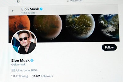Part of the Twitter page of Elon Musk is seen on the screen of a computer in Sausalito, Calif., on Monday, April 25, 2022. The Tesla CEO gave the strongest hint yet Monday, May 16, 2022, that he would like to pay less for Twitter than his $44 billion offer made the previous month.