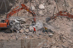 An official in Indian-controlled Kashmir said Friday that 10 workers were trapped after part of a road tunnel collapsed in the Himalayan region.