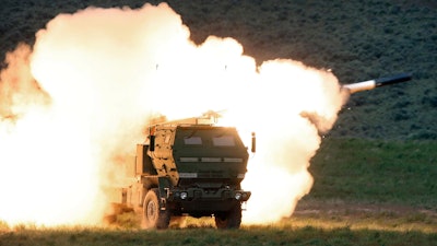 In this May 23, 2011, file photo a launch truck fires the High Mobility Artillery Rocket System (HIMARS) produced by Lockheed Martin during combat training in the high desert of the Yakima Training Center, Wash. The Biden administration is expected to announce it will send Ukraine a small number of high-tech, medium range rocket systems, U.S. officials said Tuesday. One official said the plan is to send Ukraine the HIMARS.