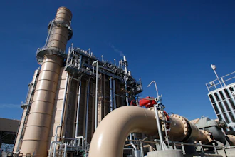 Water pipes leading to the cooling system of Pacific Gas & Electrics Colusa Generating Station near Maxwell, Calif., on Nov. 15, 2011. The utility on Wednesday, June 8, 2022, outlined a plan to achieve climate goals including net-zero emissions by 2040. The report says natural gas plants like the Colusa generating station are likely to remain online but produce 40% less emissions by 2030 compared to 2015 levels.