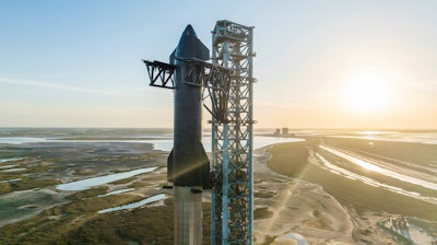 This image provided by SpaceX shows SpaceX's giant Starship rocket standing at its Texas launch pad. Elon Musk's company is looking to attempt the first orbital test flight of the nearly 400-foot-tall Starship sometime this year.