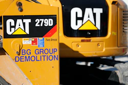 A Caterpillar 279D Compact Track Loader, left, and 308E2 CR Mini Hydraulic Excavator at a demolition site in Fort Lauderdale, Fla., May 8, 2019.