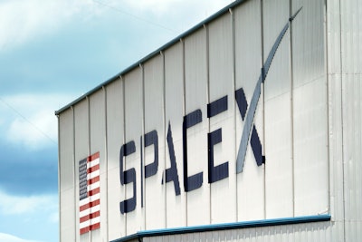 a SpaceX logo is displayed on a building on May 26, 2020, at the Kennedy Space Center in Cape Canaveral, Fla. SpaceX, the rocket ship company run by Tesla CEO Elon Musk, has fired several employees involved in an open letter that blasted the colorful billionaire for his behavior, according to media reports Friday, June 17, 2022.