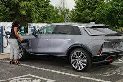Cadillac LYRIQ charging at EVgo fast charging station.