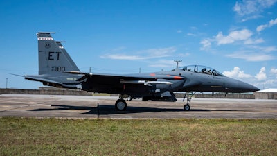 An F-15E Strike Eagle equipped with an AIM-120 D3 taxies at Eglin Air Force Base, FL for the first live-fire test of an AMRAAM F3R missile against a target.