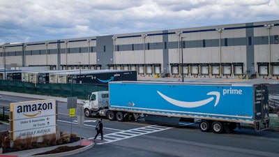 A truck arrives at an Amazon warehouse, Staten Island, N.Y., April 1, 2022.
