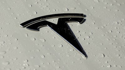 A Tesla logo is seen in Salt Lake City. The National Highway Traffic Safety Administration confirmed Friday, July 8, 2022, that it sent a Special Crash Investigations team to probe the crash of a Tesla into the back of a semitrailer at a rest area near Gainesville, Fla., earlier in the week.