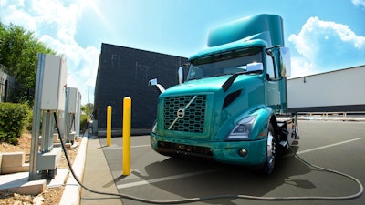 A Volvo VNR Electric charges at the high-powered chargers available to fleets at TEC Equipment, Fontana.