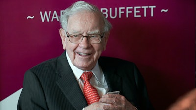 Warren Buffett, chairman and CEO of Berkshire Hathaway, smiles as he plays bridge following the annual Berkshire Hathaway shareholders meeting in Omaha, Neb., on May 5, 2019.