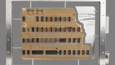 This image provided by Boston-based RR Auction, shows an authenticated Apple-1 Computer prototype from the mid-1970s that a Bay Area collector, who wishes to remain anonymous, made the winning $677,196 bid on Thursday, Aug. 18, 2022, the auctioneer said.